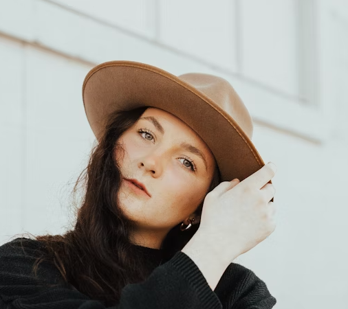 Woman in brown wide-brim hat